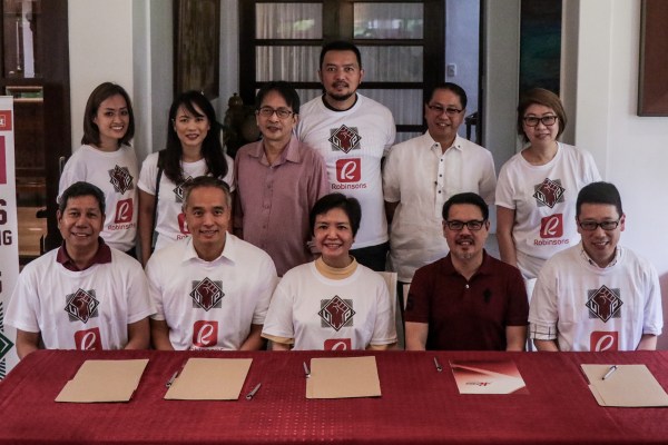 (Standing L-R) Abet Liuson, Agnes Rafinan, Michael Tan, Bo Perasol, Danilo Concepcion, Katherine Yu (Sitting L-R) Jody Gadia, Willy Co, Robina Gokongwei-Pe, Atty. Agaton Uvero, Stanley Co